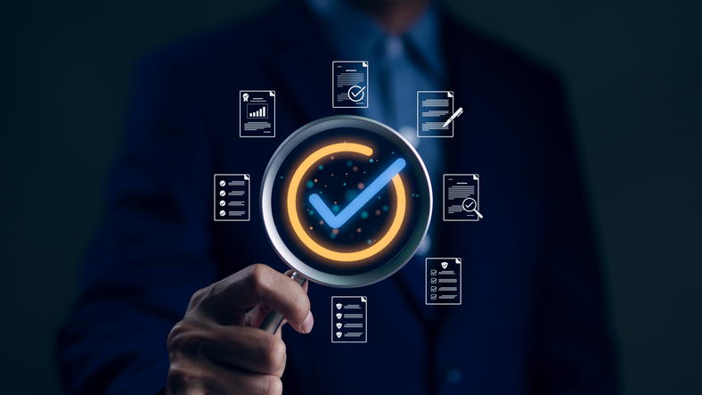 iStock-1954820499 magnifying glass with various points around